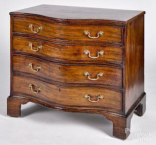 George III mahogany serpentine chest of drawers