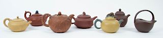 A Group of 7 Yixing Teapots.