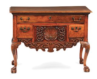 CHIPPENDALE CARVED WALNUT DRESSING TABLE. LANCASTER, PENNSYLVANIA. CIRCA 1780.