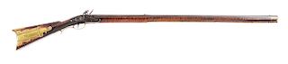 (A) CARVED FLINTLOCK KENTUCKY RIFLE SIGNED J. LOWMASTER.