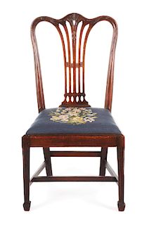 CARVED SIDE CHAIR. POSSIBLY MARYLAND. MAHOGANY. CIRCA 1790.