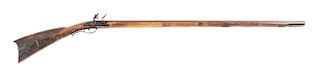 (A) AS FOUND RELIEF CARVED FLINTLOCK RIFLE ATTRIBUTED TO LEONARD REEDY.