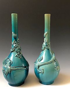 A PAIR OF CHINESE ANTIQUE BLUE GLAZED DRAGON VASES. 19 CENTURY
