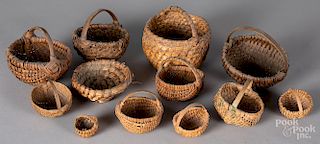 Group of small woven baskets.