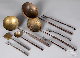 Set of wrought iron and brass kitchen utensils