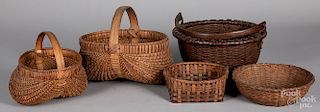 Five assorted woven baskets