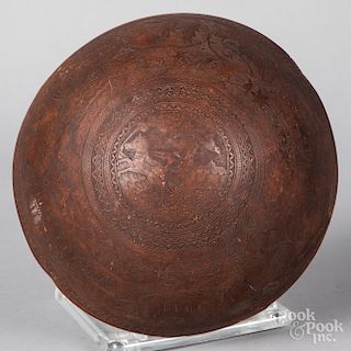 Intricately carved coconut shell