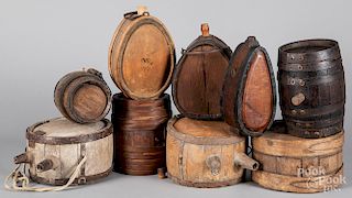 Nine wood canteens and barrels