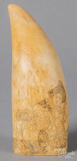 Scrimshaw decorated whale tooth
