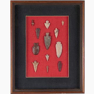 (12) Indian stone projectile points in display