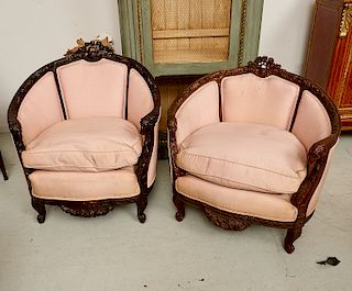 Near pair Louis XV style carved walnut bergeres