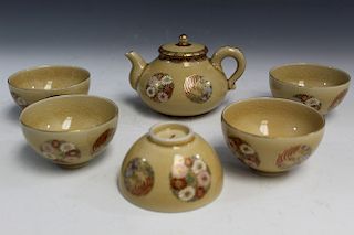 A Set of Japanese Porcelain Teapot and 5 Teacups.
