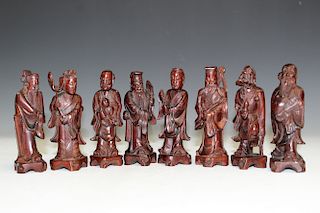 A Set of Eight Chinese Carved Wood Statues.