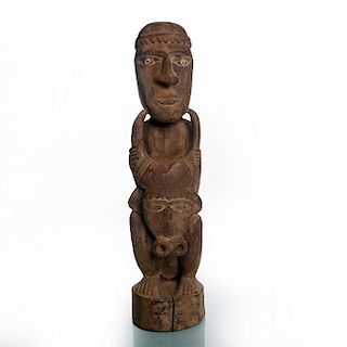 AFRICAN TRIBAL WOODEN SCULPTURE OF MAN WITH BULLS HEAD