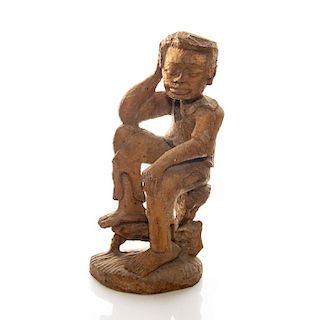 HAND CARVED WOODEN SCULPTURE OF YOUNG MAN SITTING
