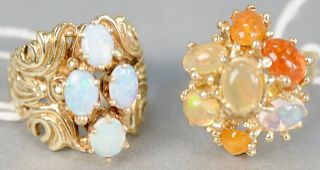 Two gold rings, with stones, one with four opals.