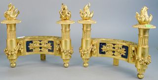 Pair of French bronze dore chenets having flaming torchiere ends, wreaths of flowers and fruit, ht. 12 1/2 in., lg. 13 in.
