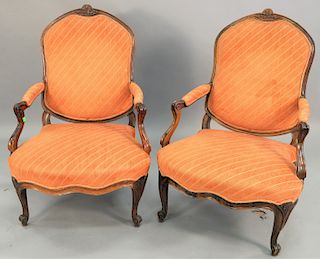 Pair of Louis XV style walnut fauteuils. ht. 38 1/2 in., wd. 27 1/2 in.