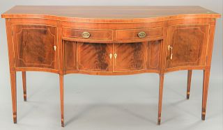 Custom mahogany federal style sideboard, with serpentine front over two drawers over flanked doors. ht. 40 1/2 in., wd. 73 in., dp. 30 in.