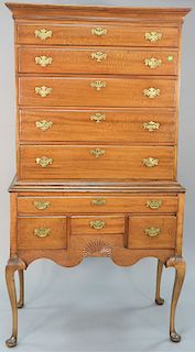 Queen Anne flat top highboy, in two parts set on cabriole legs with pad feet, ht. 76 in., uppercase wd. 36 in.