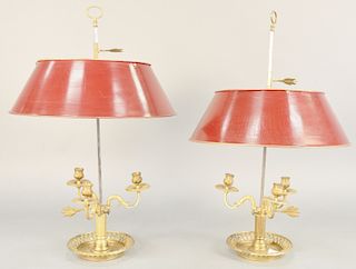 Pair of Louis XVI style gilt bronze bouillotte table lamps having adjustable tole shade. ht. 25 in.
