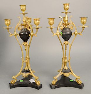 Pair of bronze candelabras with claw feet on black slate base. ht. 18 3/4 in.