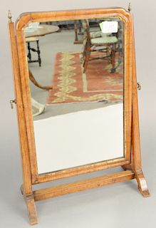 Queen Anne mirror now in a later mahogany stand, 18th century, ht. 19 1/2 in., wd. 13 in.