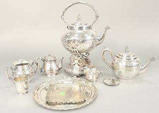 Nine piece Tiffany silver soldered group, to include a tea set, sugar, teapot, creamer, tilting pot, etc. tallest 14 in.