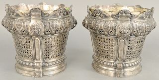 Pair of silver plated planters having lion marks and reticulated body, ht. 10 in., dia. 10 in.