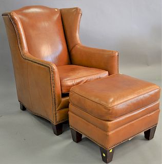 Henredon leather wing chair and ottoman, height 40 in., width 33 in.