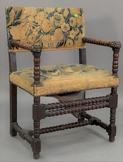 Jacobean armchair, with carved face hand rests and aubusson upholstery (restored), ht. 33 1/2in., wd. 23in.