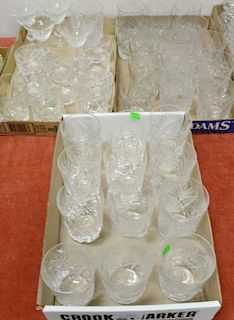 Three tray lot Group of cut glass, to include cups, glasses, and stems.