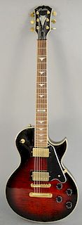 Tradition electric guitar, Les Paul model marked S2002, serial number 02120264, in fitted case.