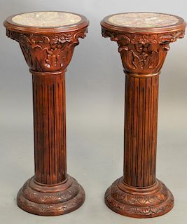 Pair of mahogany pedestals, with round insert marble tops, ht. 36 in., dia. 16 in.
