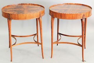 Pair of mahogany round tables, with scalloped gallery tops, ht. 28 in., top 24 in., dia. 24 in.