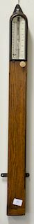 Victorian oak stick barometer by J. Casartelli & Son, ht. 37 1/2 in.