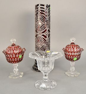 Four piece crystal lot to include Val St. Lambert compote (ht. 7 3/4"), pair of cranberry cut to clear covered sweet meat compotes, large cut glass va