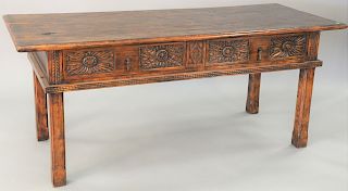 Renaissance style two drawer table, having carved drawer front, ht. 30 1/2 in., top 30" x 72"