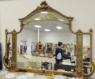 Large decorative mirror, having yellow mirror decoration, ht. 56 in., wd. 72 in.