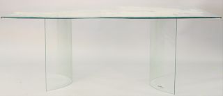 Glass top table, with curved glass supports, ht. 28 1/2 in., top 42 x 72 in.