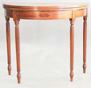 Custom mahogany Sheraton style Demilune game table, ht. 31 1/2in., wd. 36 in.
