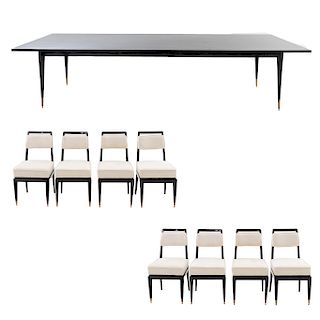 Comedor. Siglo XX. Estilo modernista. Elaborada en madera laqueada. Consta de: Mesa y 8 sillas. 75 x 330 x 123 cm. (mesa)