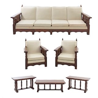 Sala. Siglo XX. En talla de madera. Consta de: Sofá de 4 plazas, par de sillones, par de mesas laterales y mesa de centro. Piezas: 6.