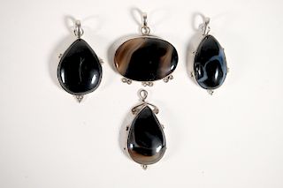 Group, Four Sterling & Polished Stone Pendants
