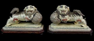 A Pair of Chinese Export Bone Foo Lion Sculptures