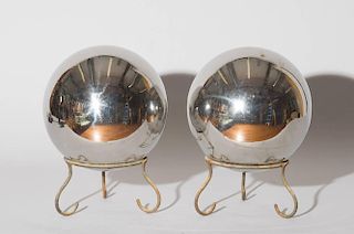 TWO GLASS GARDEN GAZING BALLS ON WROUGHT IRON STANDS