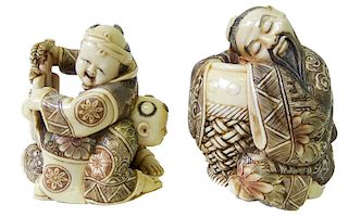 (2) Two Chinese Carved Figures.