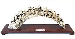 A Chinese Export Carved Bone Dog Theme Sculpture