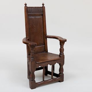Rare Henri IV Carved Oak 'Cacquetoire' Armchair