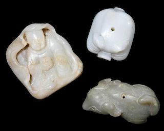 Three Chinese Carved Jade and Hardstone Toggles